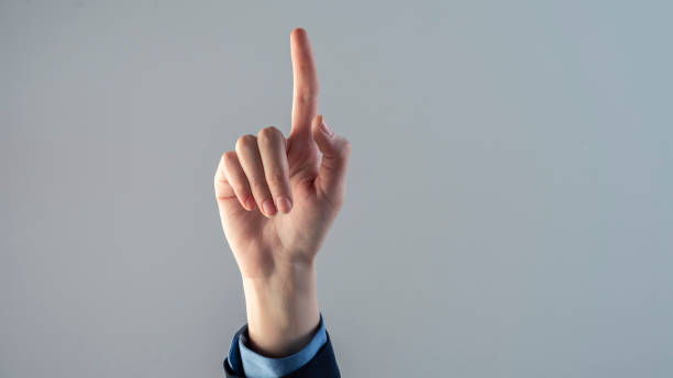 istock Female finger pressing a search button on a digital screen 1389183455
