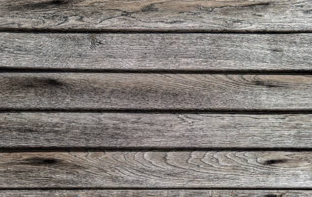 istock Light wooden background. Rough boards. Natural wood texture and pattern. 1389186568