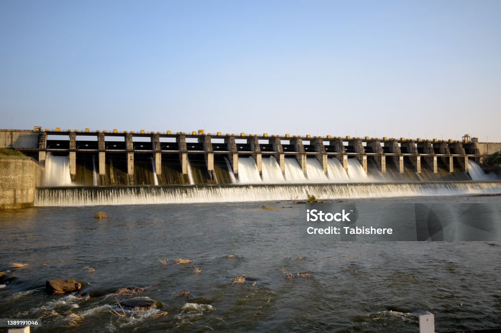 Dam water release,The excess capacity of the dam until spring-way overflows. Dam Stock Photo