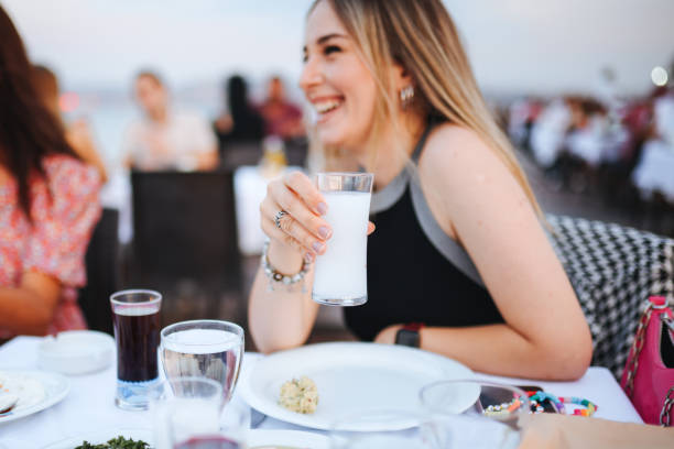 istock Young Women drinking Turkish Raki 1389196011