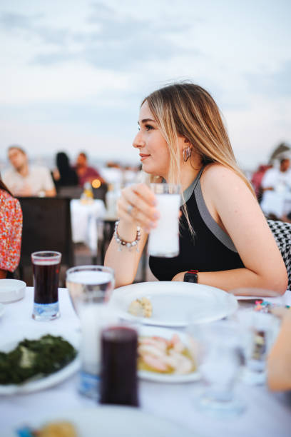 istock Young Women drinking Turkish Raki 1389196024