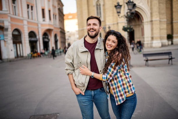 istock Young couple outdoors having great time 1389198282