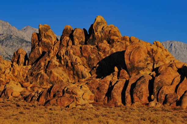 Early morning light on the rock formations of the Alabama Hills National Scenic Area, Lone Pine, Eastern Sierra, California, USA