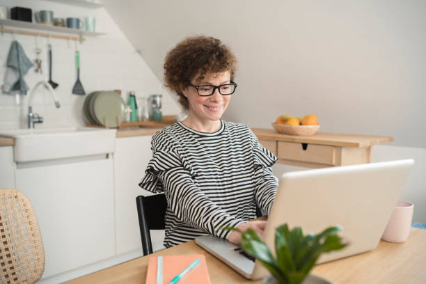 istock Business woman working from home 1389199202