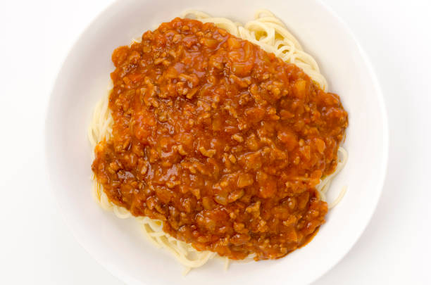 spaghetti with meat sauce on a white background