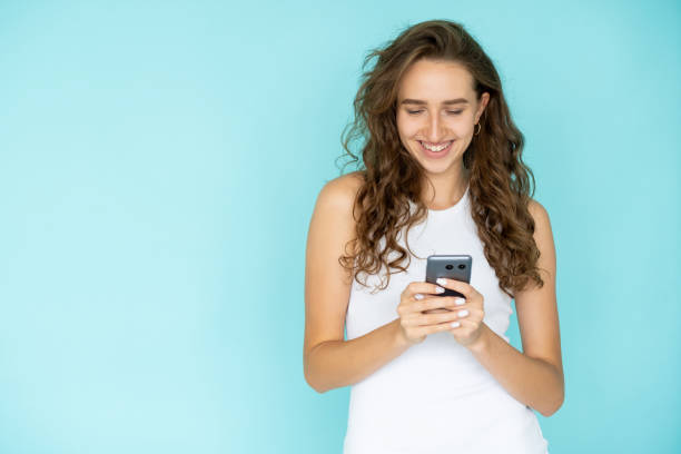 istock mobile communication happy woman virtual chatting 1389206373
