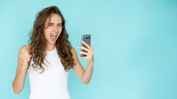 istock furious madness shouting woman online connection 1389206378