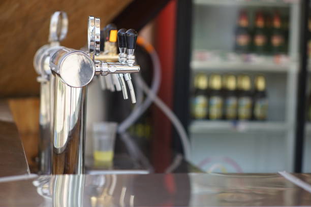 istock Chrome beer taps in a summer bar. 1389207606