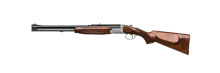 Luxury double-barreled shotgun with a vertical arrangement of barrels. Expensive weapon for hunters. Isolate on a white background.