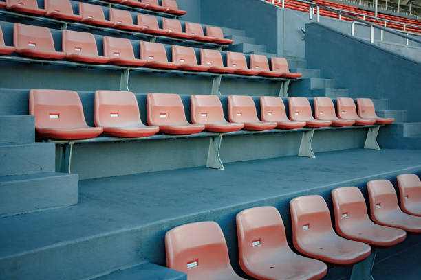 istock Stadium seats full of space 1389237051