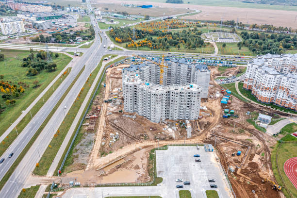 istock construction site with multi-story buildings under construction. urban residential area development. aerial photo. 1389240953