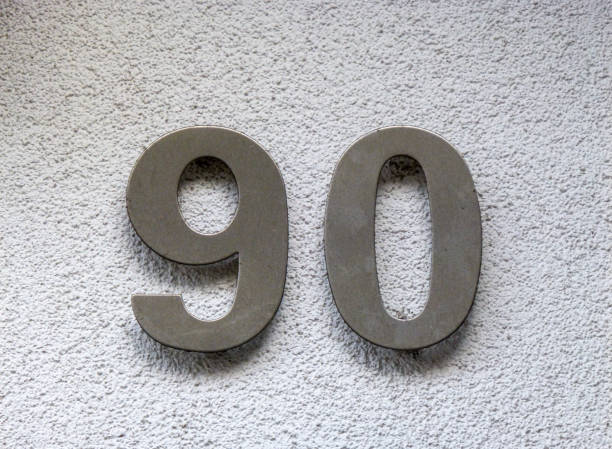 istock Metal home number on a wall 1389249771