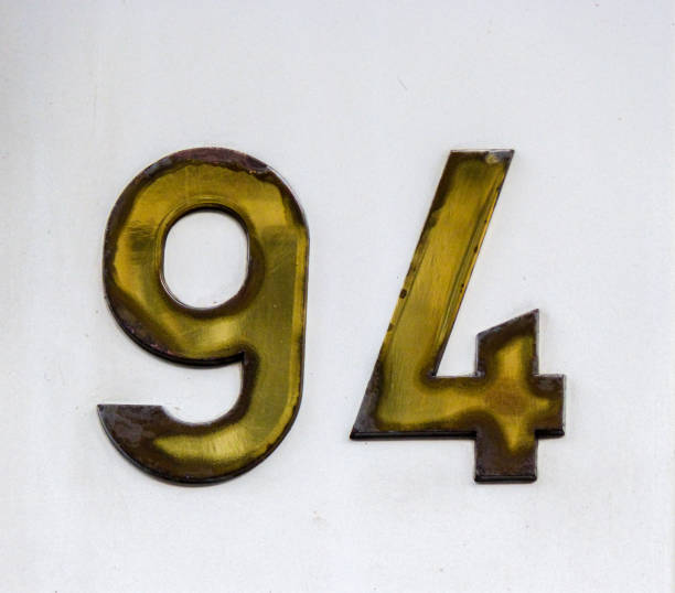 Metal home number on a wall