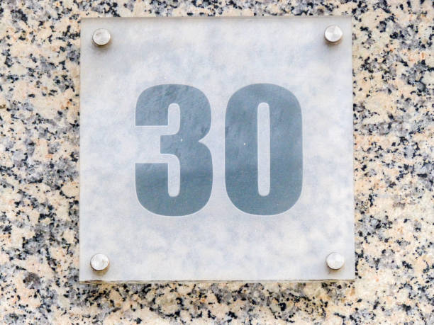 istock Metal home number on a wall 1389249858