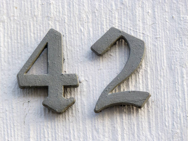 istock Metal home number on a wall 1389249859