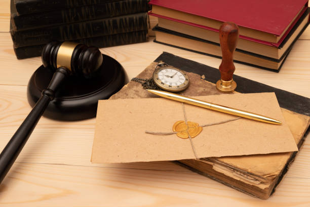 istock Vintage stamp, envelope and testament. Notary public tools 1389254320