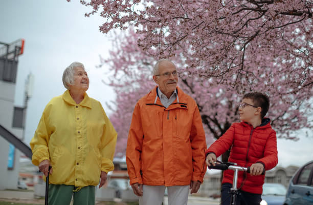 istock Old people walking in the spring 1389269161
