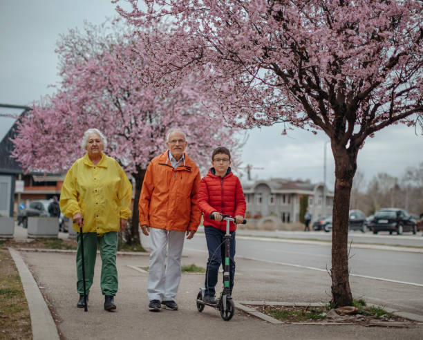 istock Old people walking in the spring 1389269165