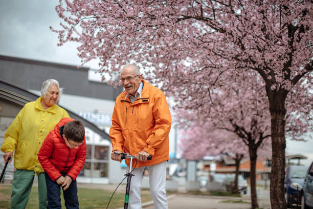 istock Old people walking in the spring 1389269198
