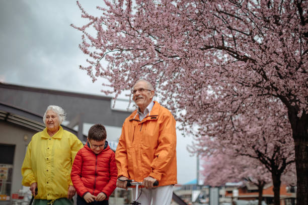 istock Old people walking in the spring 1389269204
