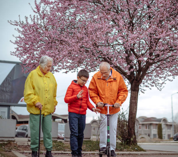 istock Old people walking in the spring 1389269242