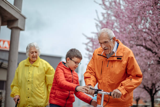 istock Old people walking in the spring 1389269267