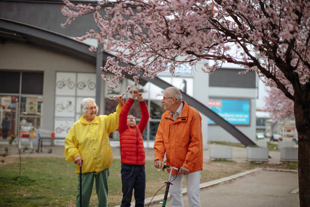 istock Old people walking in the spring 1389269844