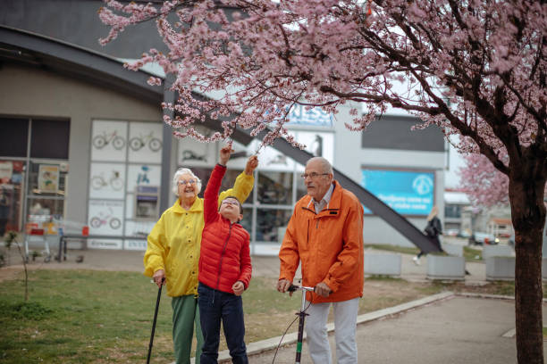 istock Old people walking in the spring 1389269906
