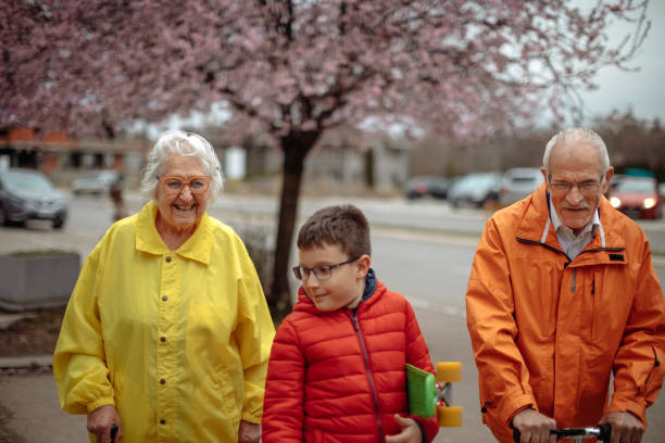 istock Old people walking in the spring 1389269935