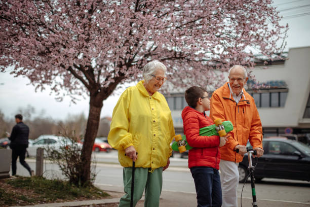 istock Old people walking in the spring 1389269936