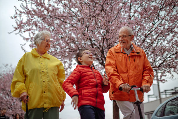 istock Old people walking in the spring 1389269952
