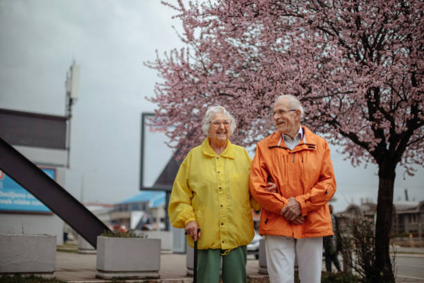 istock Old people taking a walk in the spring 1389270009
