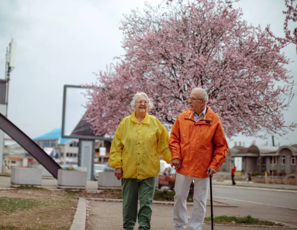 istock Old people taking a walk in the spring 1389270111