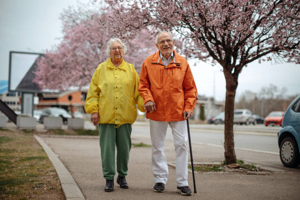 istock Old people taking a walk in the spring 1389270298