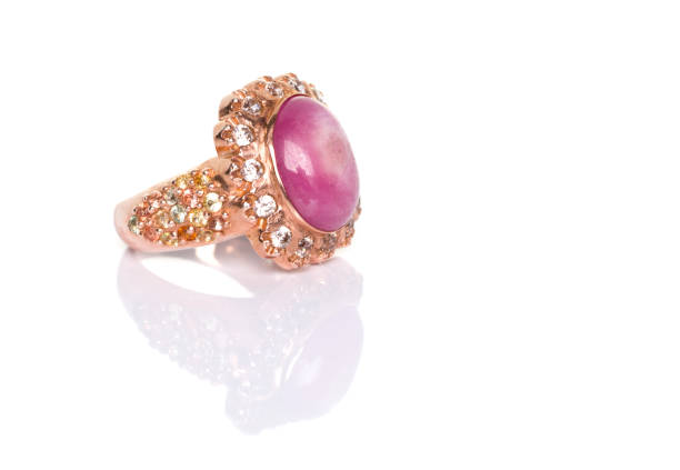 istock Ruby Sapphire and Diamond Jewel or gems ring on white background with reflection. Collection of natural gemstones accessories. Side view, Studio shot 1389270486