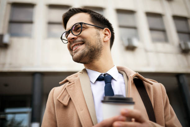 istock Businessman on a way to work in city 1389274721