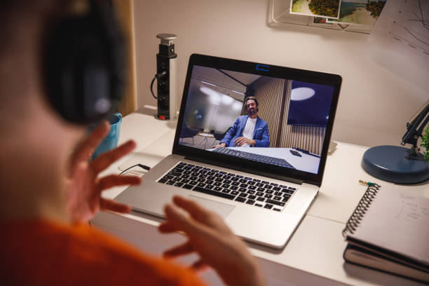 istock Selective focus shot of young man gesturing while video chatting with a friend 1389274823