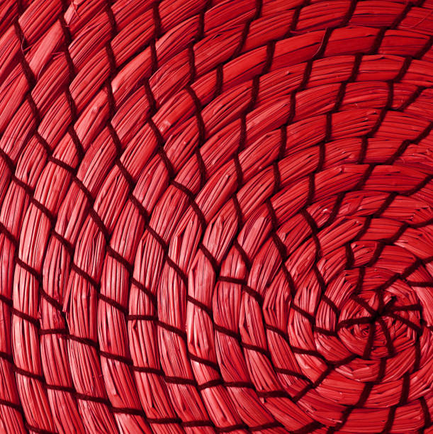 Artistic crimson red colored woven water hyacinth place mat