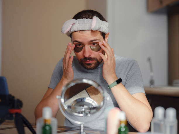istock Men's beauty concept. caucAsian guy checking his skin. 1389281797