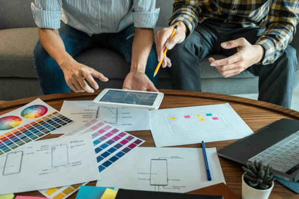 istock Professional Creative Team of Web/Graphic Designer planning, drawing website ux app for mobile phone application and development template layout, process to prototype wireframe, User experience 1389283897