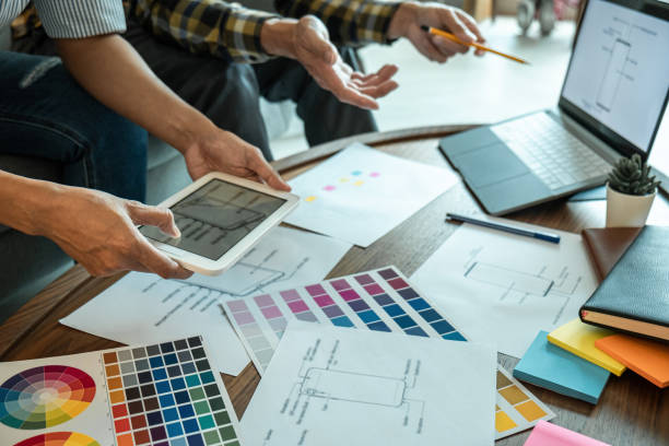 istock Team of Creative Web/Graphic Designer planning, drawing website ux app for mobile phone application and development template layout, process to developing prototype wireframe, User experience concept 1389283898