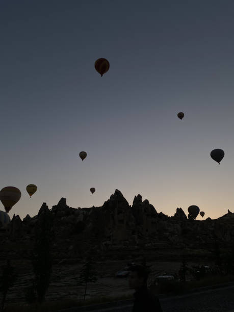 istock Hot Air Balloons Silhouette at Cappadocia 1389287267