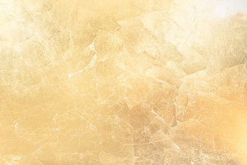 Gold shiny surface grunge texture background