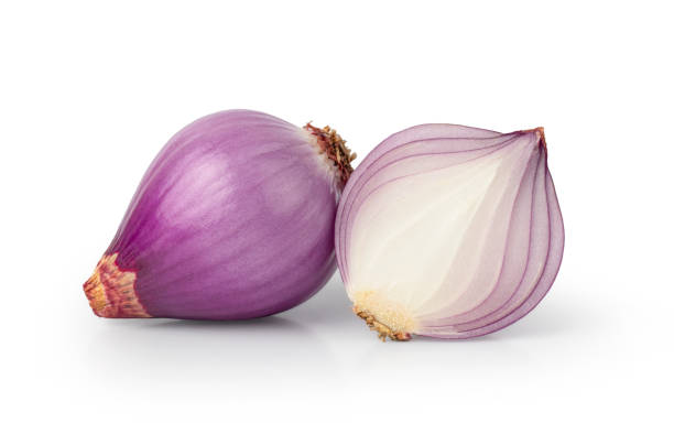 istock Red whole and sliced onion isolated on white background with Clipping Path. 1389304150