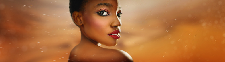 an africa symbol image on the beautiful african young woman. Vogue style close-up portrait of beautiful african girl - panorama