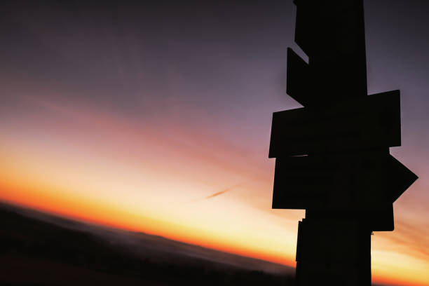 istock a signpost in the mountain at the sunset 1389308215