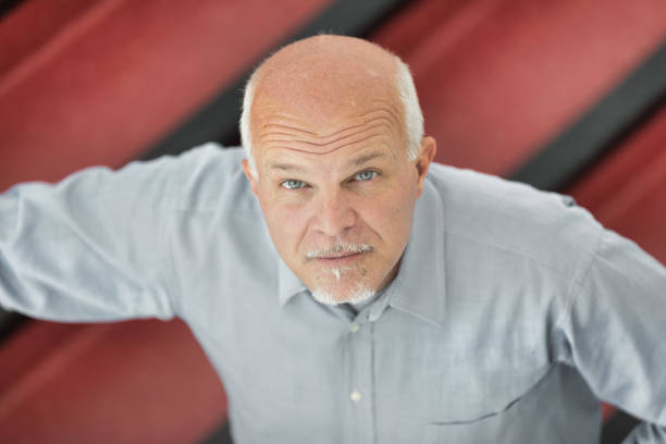 istock Man with slight smile seen from above 1389309919
