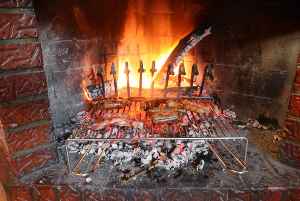 istock fireplace with hot flames and bbq meal 1389311471