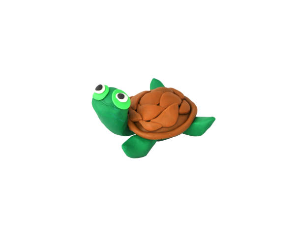 istock turtle made of plasticine on white background 1389317766