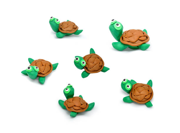 istock turtle made of plasticine on white background 1389317800